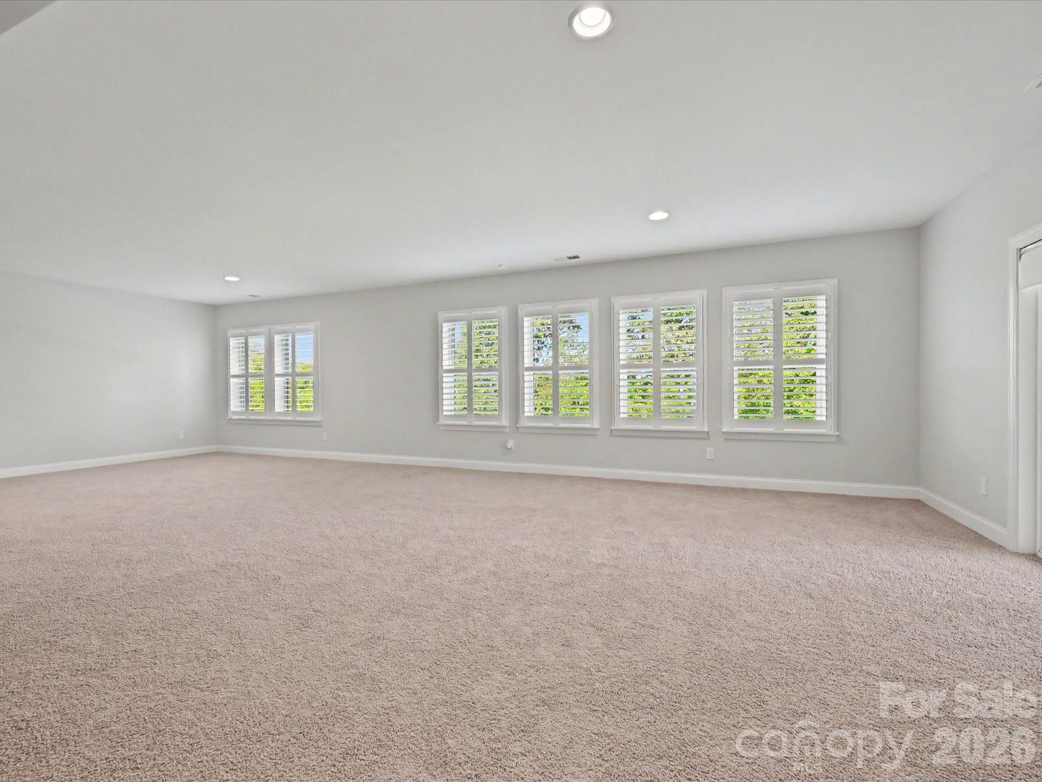 315 West Waterlynn Road Mooresville, NC 28117 - Photo 41 of 46 an empty room with windows