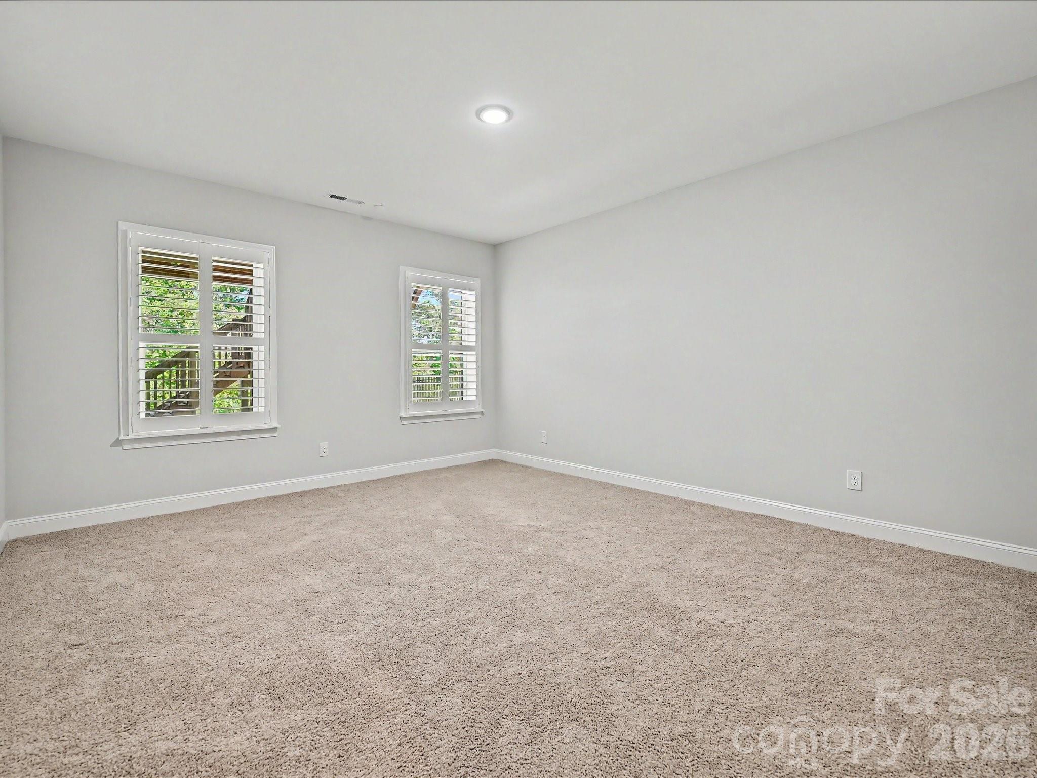 315 West Waterlynn Road Mooresville, NC 28117 - Photo 42 of 46 an empty room with windows