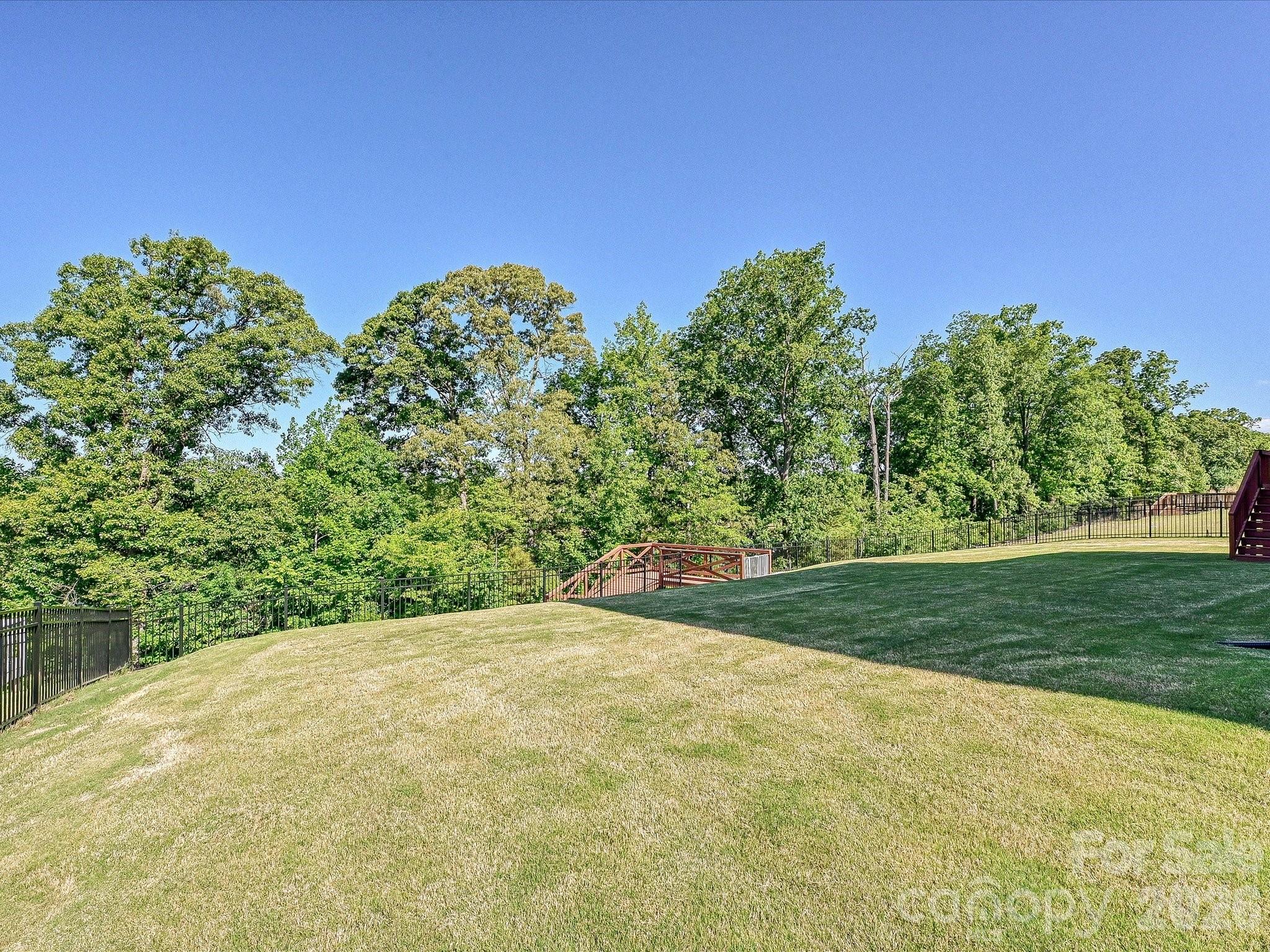 315 West Waterlynn Road Mooresville, NC 28117 - Photo 45 of 46 a view of a yard with a tree