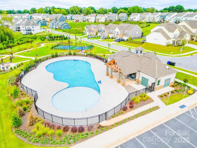 a view of swimming pool with a garden