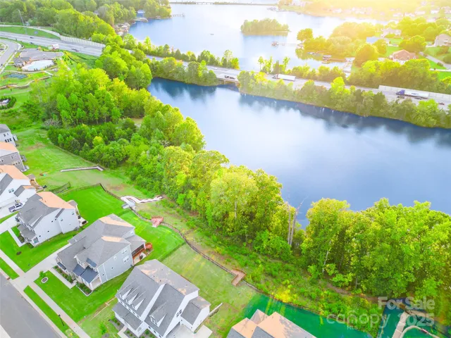 a view of a lake with houses