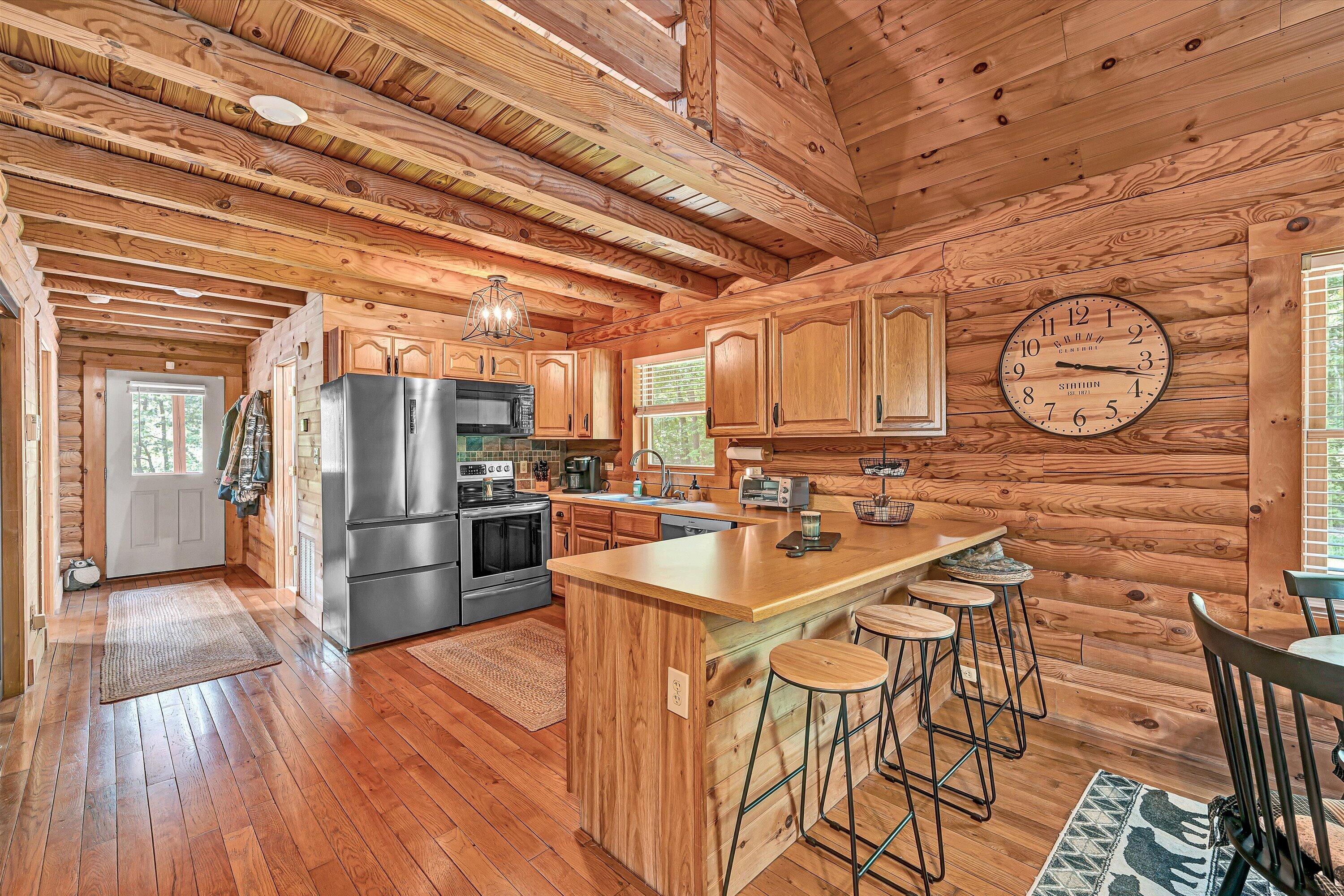 6211 Hillcrest Road Salem, VA 24153 - Photo 11 of 36 a kitchen with stainless steel appliances a refrigerator and a stove