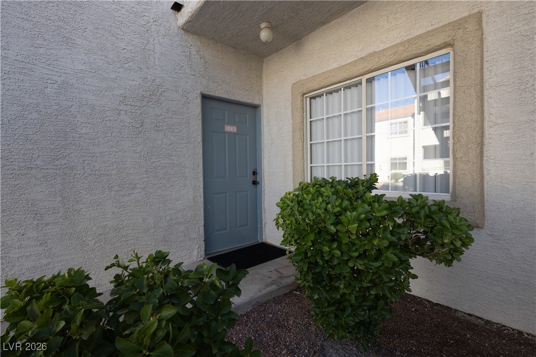 3318 North Decatur Boulevard, Unit 1082 Las Vegas, NV 89130 - Photo 22 of 25 Entrance to property with stucco siding
