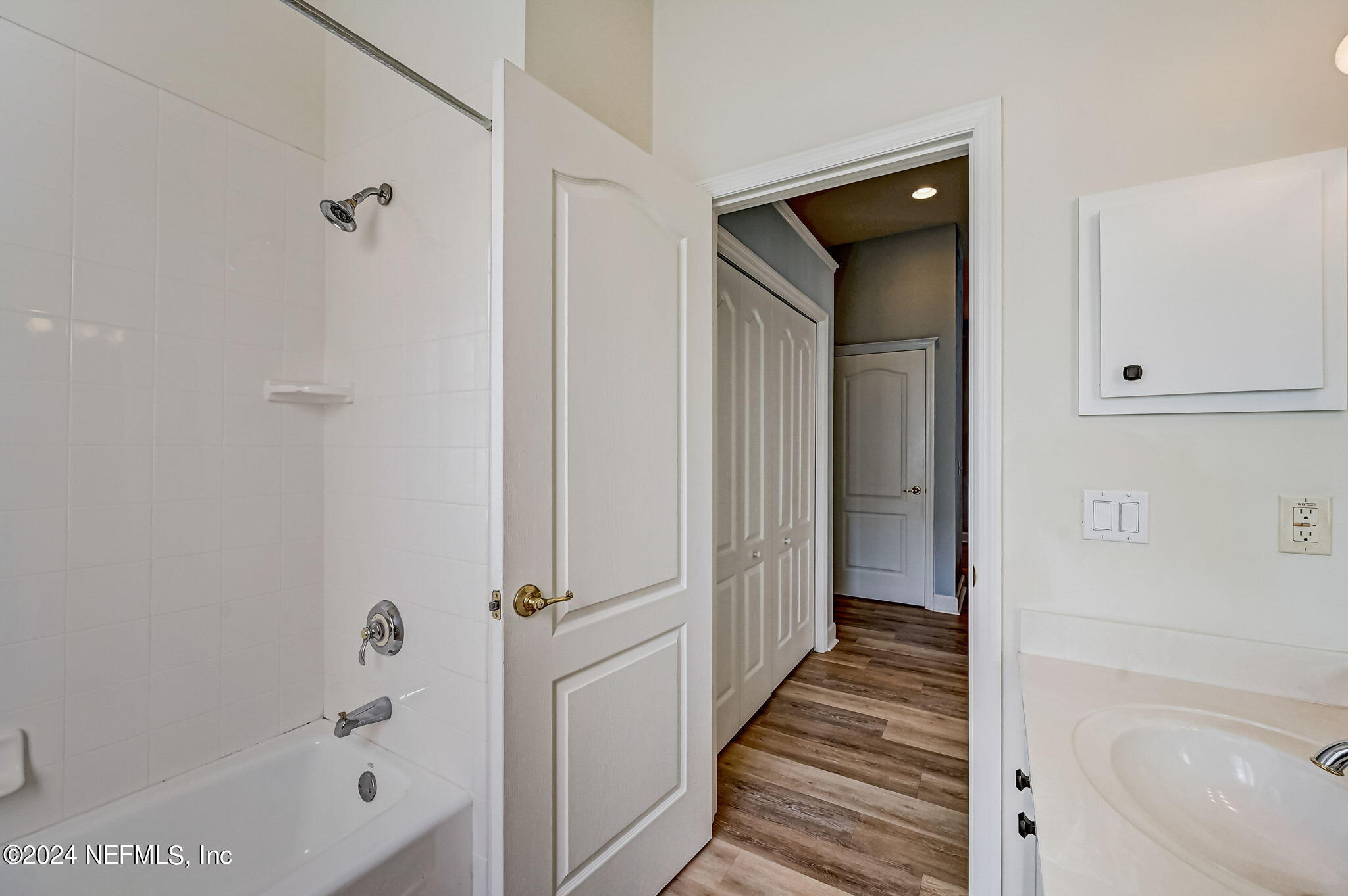 1308 Asher Court Ormond Beach, FL 32174 - Photo 17 of 40 a bathroom with a tub and shower