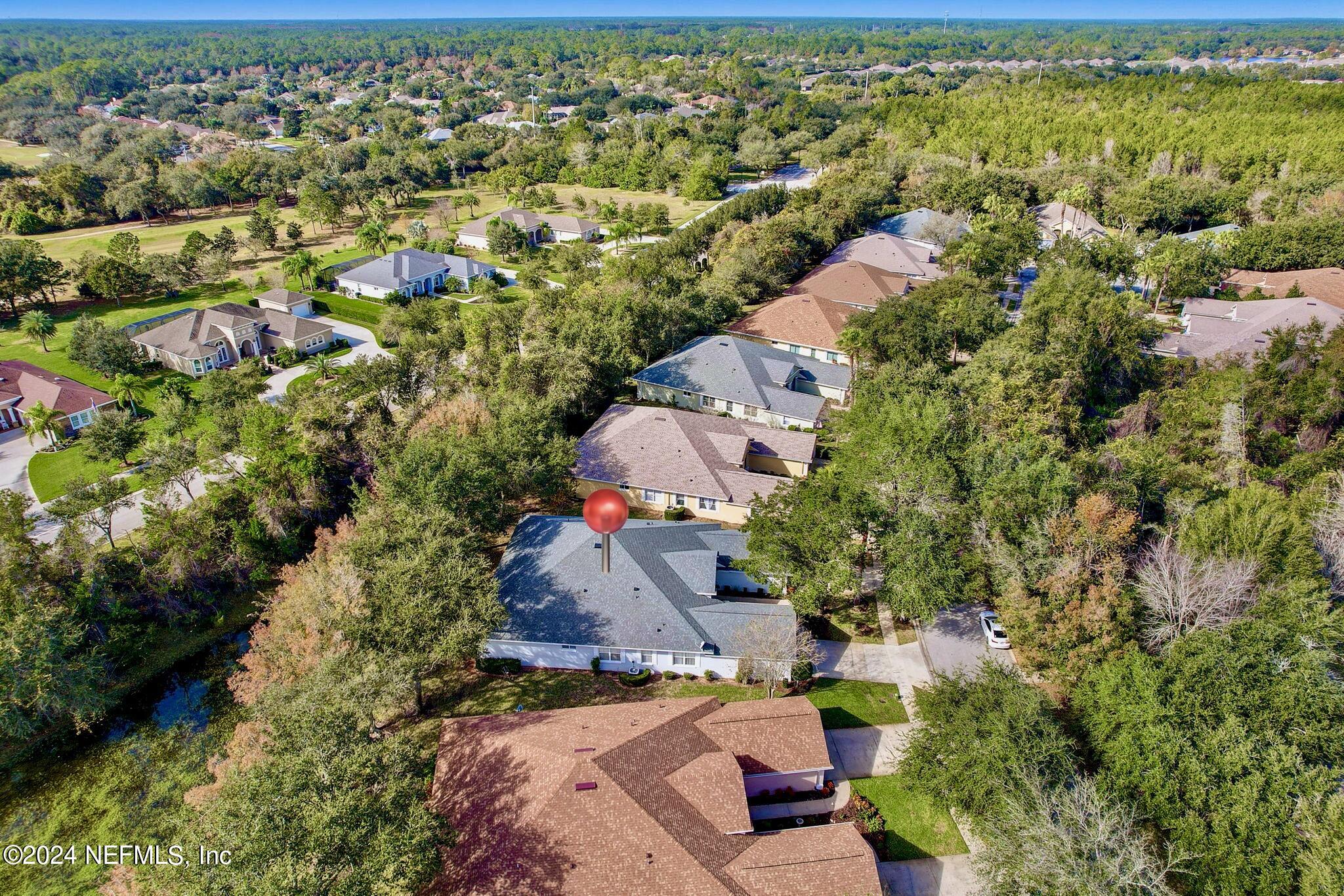 1308 Asher Court Ormond Beach, FL 32174 - Photo 26 of 40 an aerial view of residential houses with outdoor space