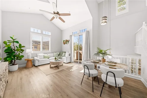 a living room with furniture or window and wooden floor