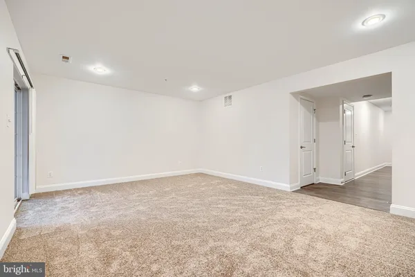 an empty room with an entryway