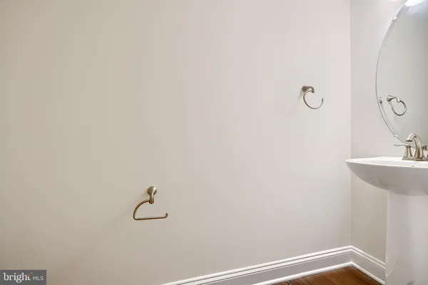a bathroom with a sink and vanity