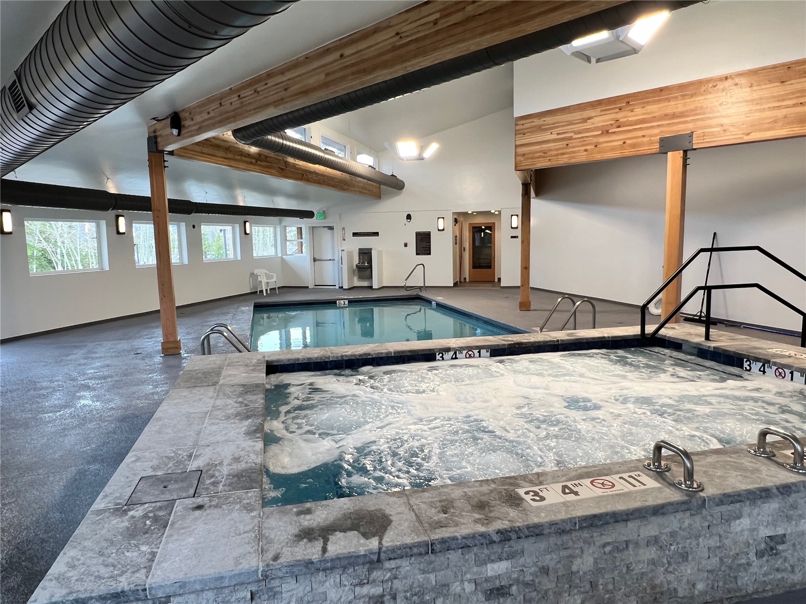 89410 Ryan Gulch Road, Unit 104 Silverthorne, CO 80498 - Photo 29 of 31 a view of a living room and window