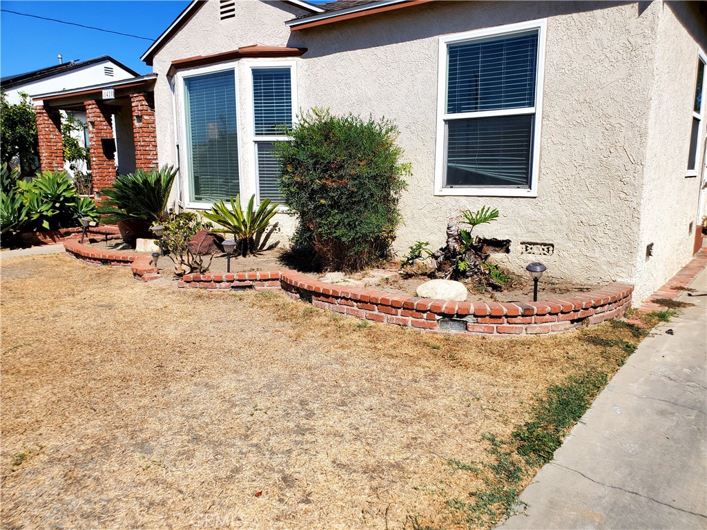 1420 South Butler Avenue Compton, CA 90221 - Photo 11 of 44 a view of a house with backyard and sitting area