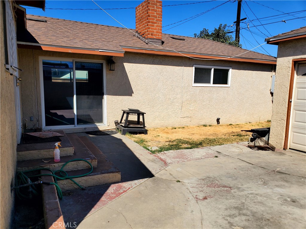 1420 South Butler Avenue Compton, CA 90221 - Photo 12 of 44 a view of a house with backyard and sitting area