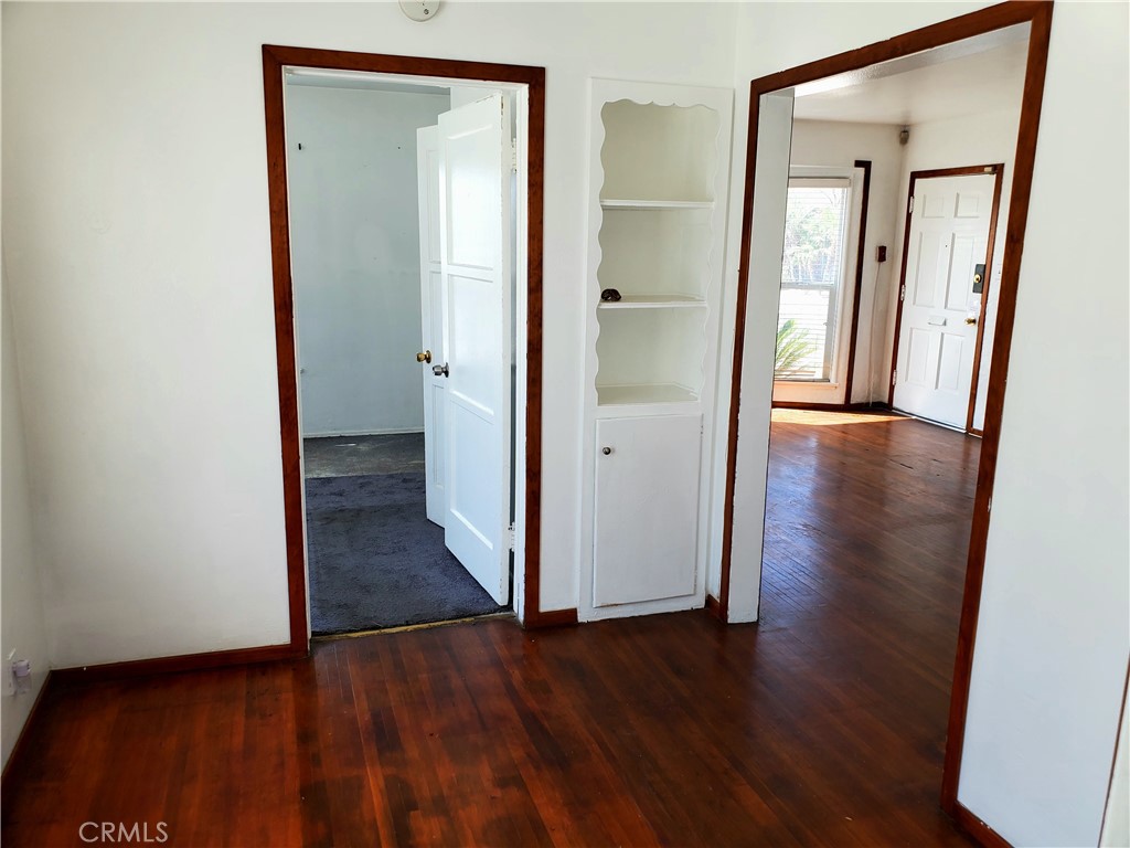 1420 South Butler Avenue Compton, CA 90221 - Photo 17 of 44 a view of a hallway with wooden floor