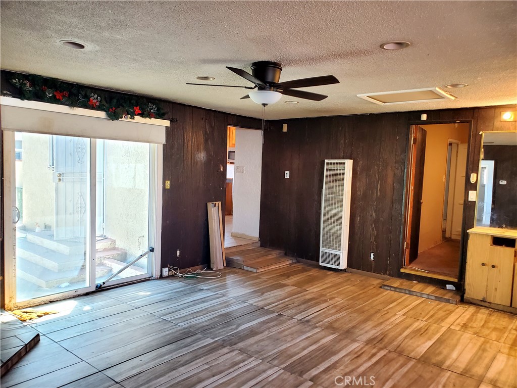 1420 South Butler Avenue Compton, CA 90221 - Photo 24 of 44 a view of hallway with wooden floor and stairs