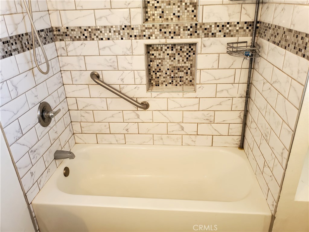 1420 South Butler Avenue Compton, CA 90221 - Photo 37 of 44 a bathroom with a bathtub