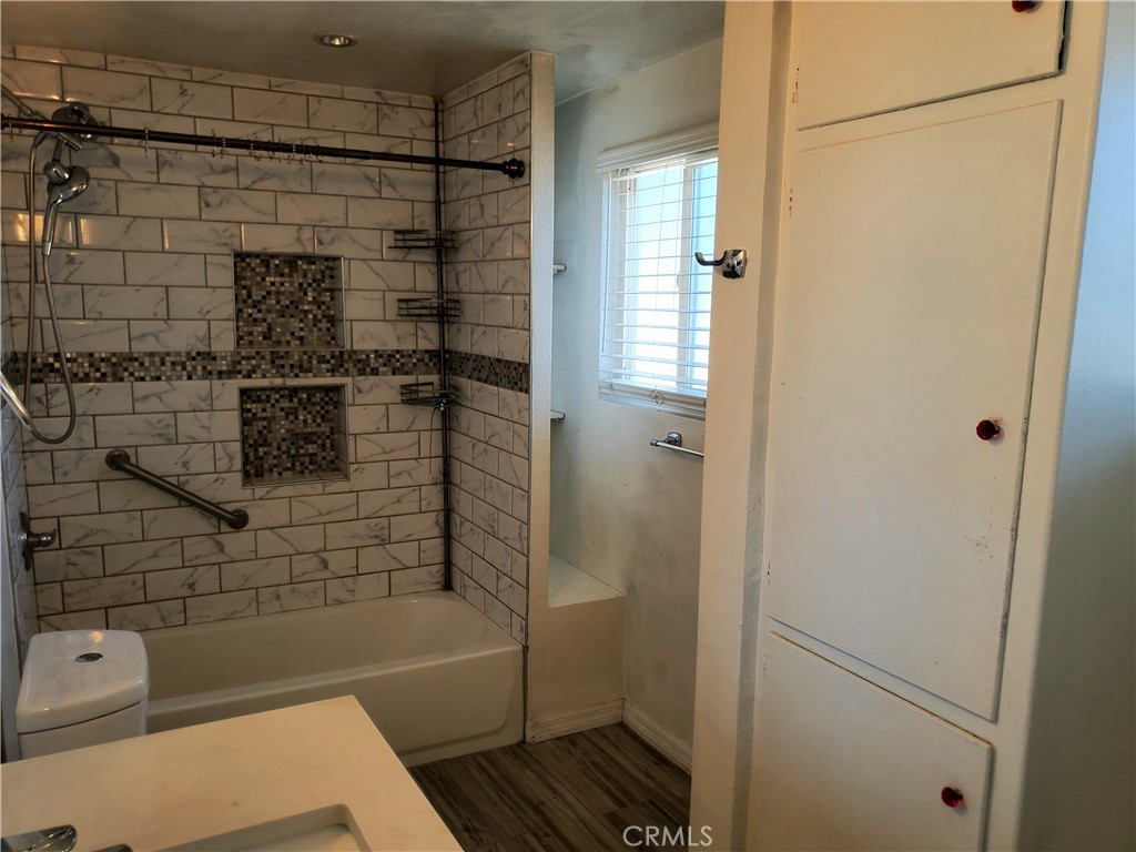 1420 South Butler Avenue Compton, CA 90221 - Photo 38 of 44 a bathroom with a shower and a toilet