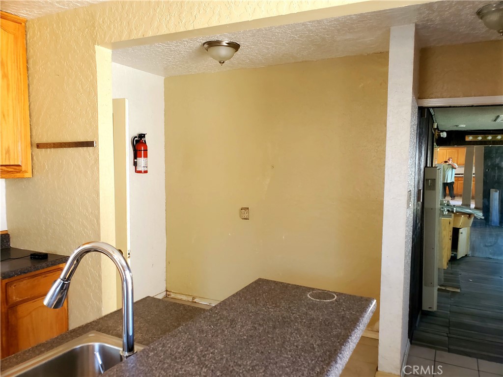 1420 South Butler Avenue Compton, CA 90221 - Photo 44 of 44 a view of a hallway with a dining area