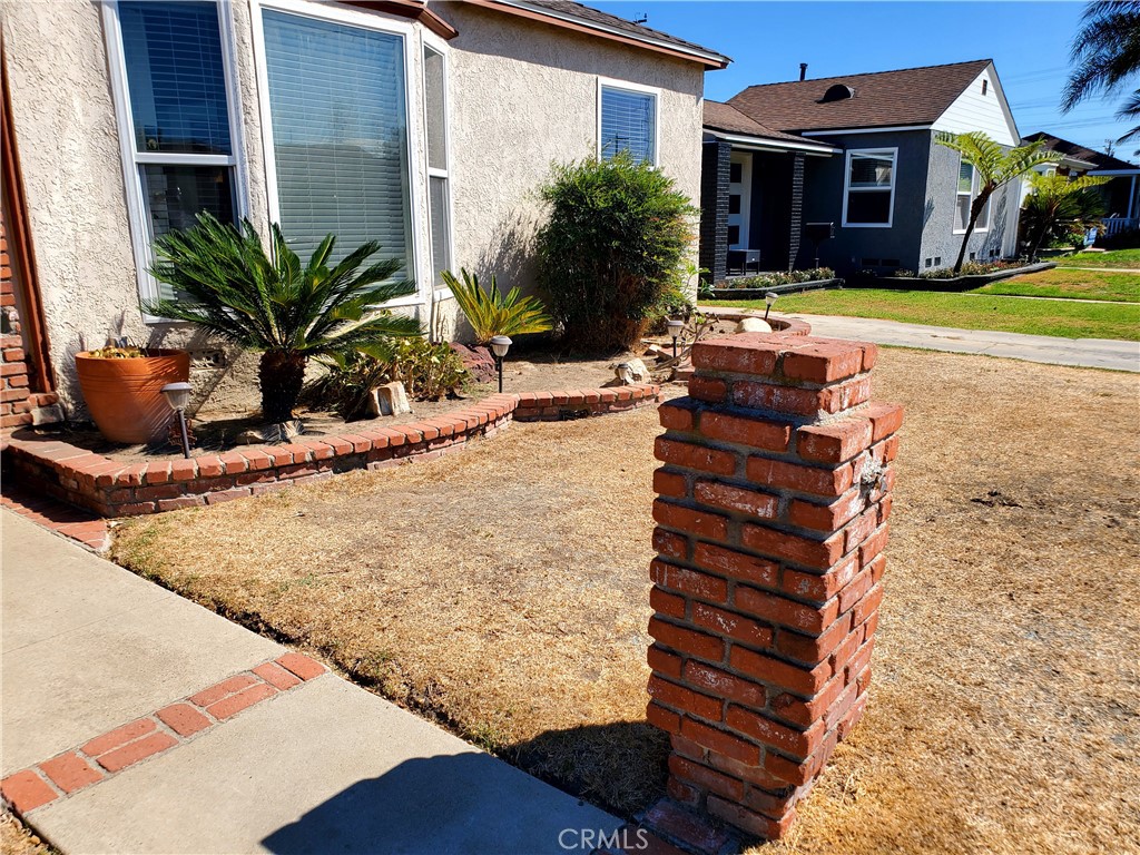 1420 South Butler Avenue Compton, CA 90221 - Photo 7 of 44 a view of a house with backyard and sitting area