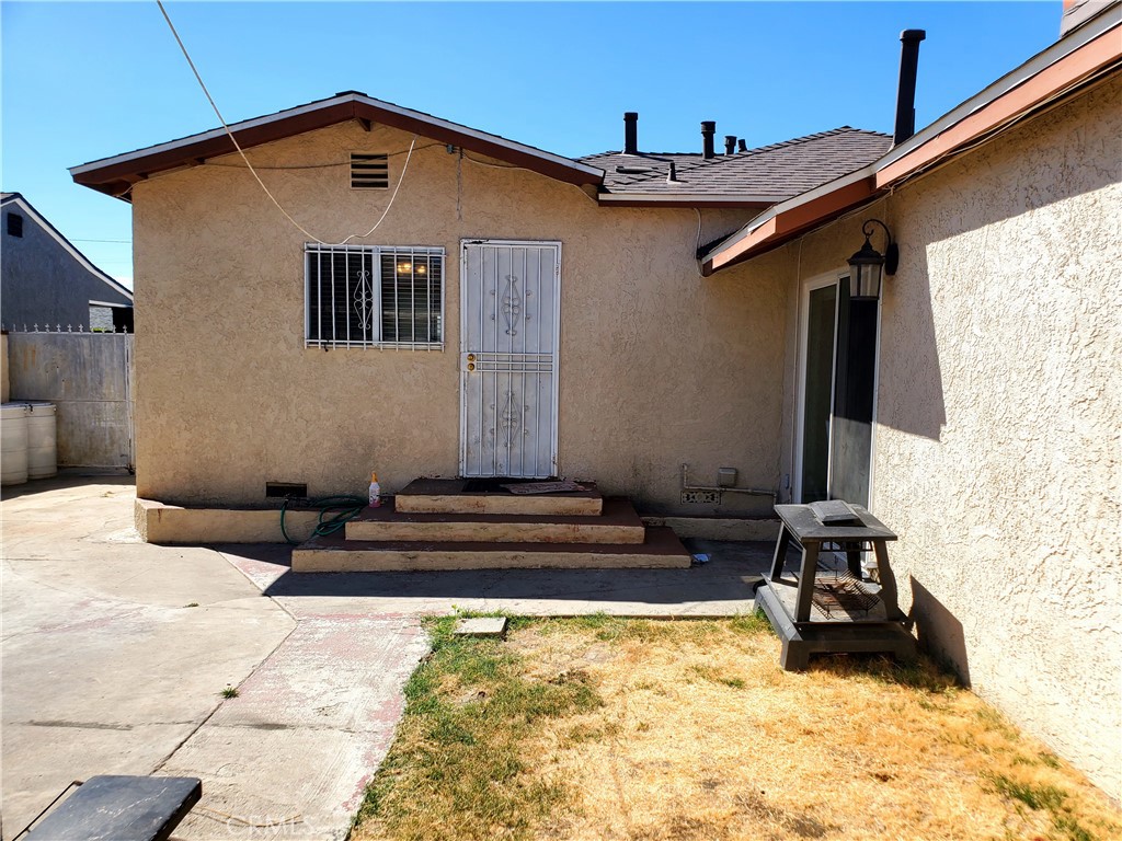 1420 South Butler Avenue Compton, CA 90221 - Photo 9 of 44 a house view with a backyard space