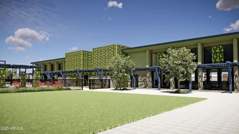 a front view of building with yard