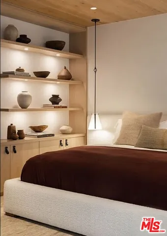 a bathroom with a double vanity sink mirror and bathtub