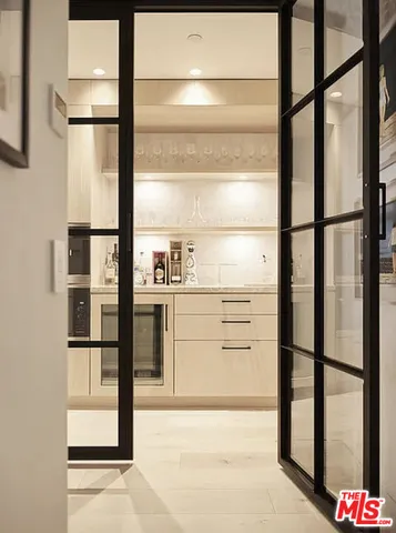 a view of a swimming pool with chairs