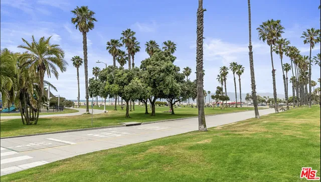 a view of a street with cars