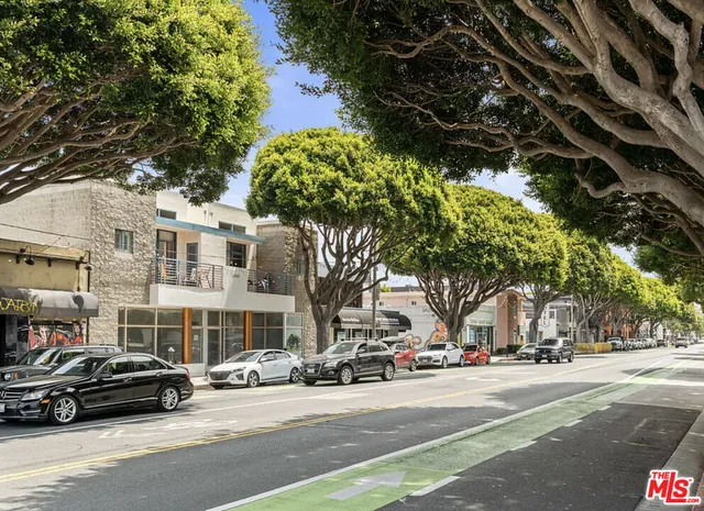 a front view of a building with street view