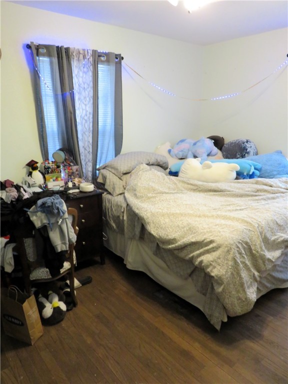 1413 Sandy Point Road Bryan, TX 77803 - Photo 9 of 23 a bedroom with a bed and a mirror