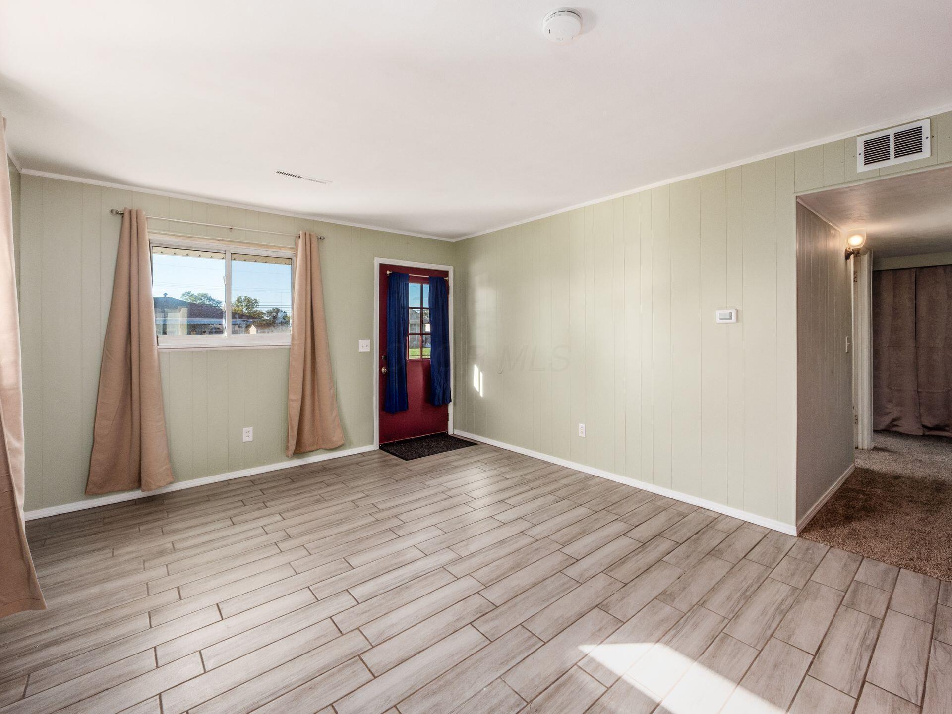 884 Bruckner Road Columbus, OH 43207 - Photo 6 of 29 New Ceramic Tile Floor - Freshly Painted
