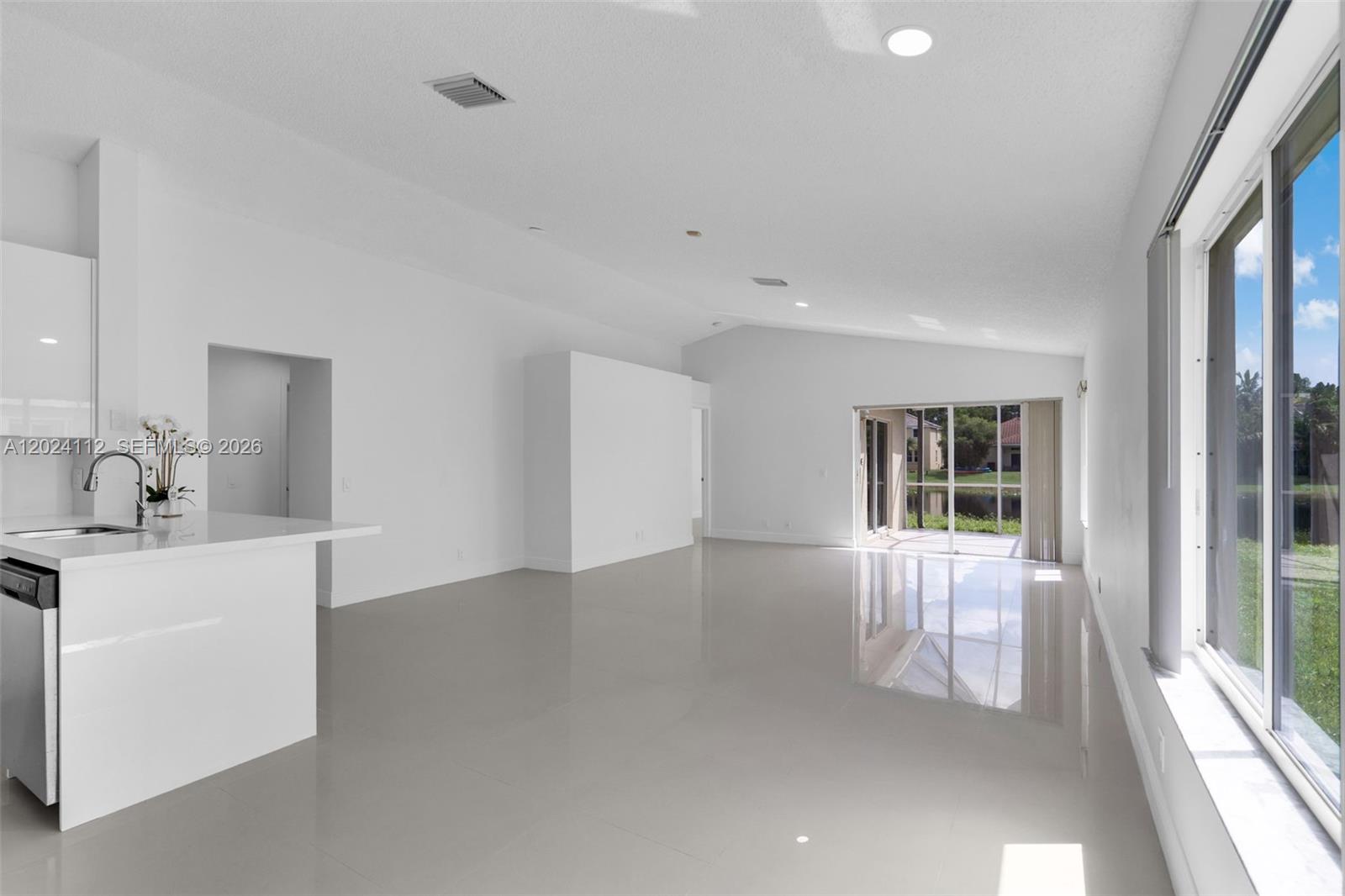 4366 Mahogany Ridge Drive Weston, FL 33331 - Photo 4 of 41 a view of an empty room with a window and bathroom