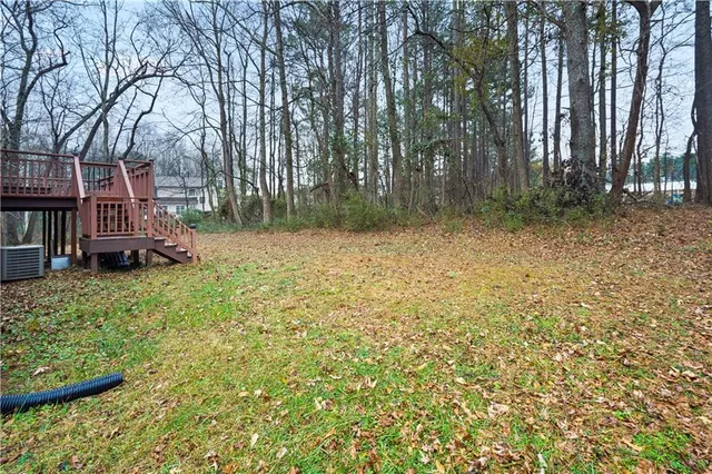 a backyard of a house with lots of green space