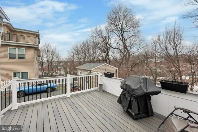 a view of a deck with furniture