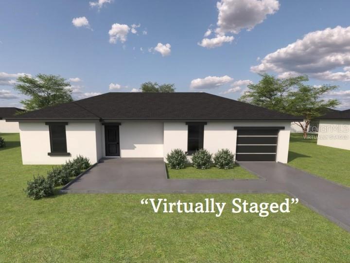 423 Water Road Ocala, FL 34472 - Photo 1 of 2 a front view of a house with a yard