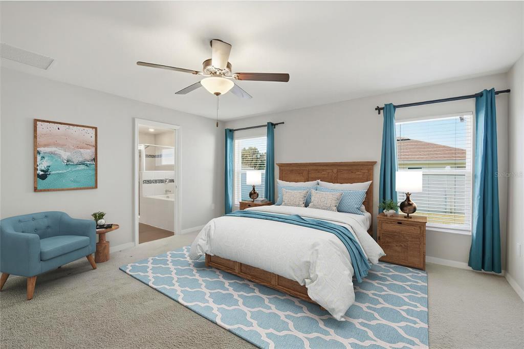 212 Serena Ridge Drive Seffner, FL 33584 - Photo 12 of 22 a bedroom with a bed and a couch