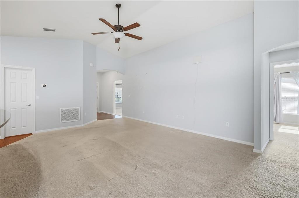 212 Serena Ridge Drive Seffner, FL 33584 - Photo 6 of 22 a view of a livingroom with a ceiling fan