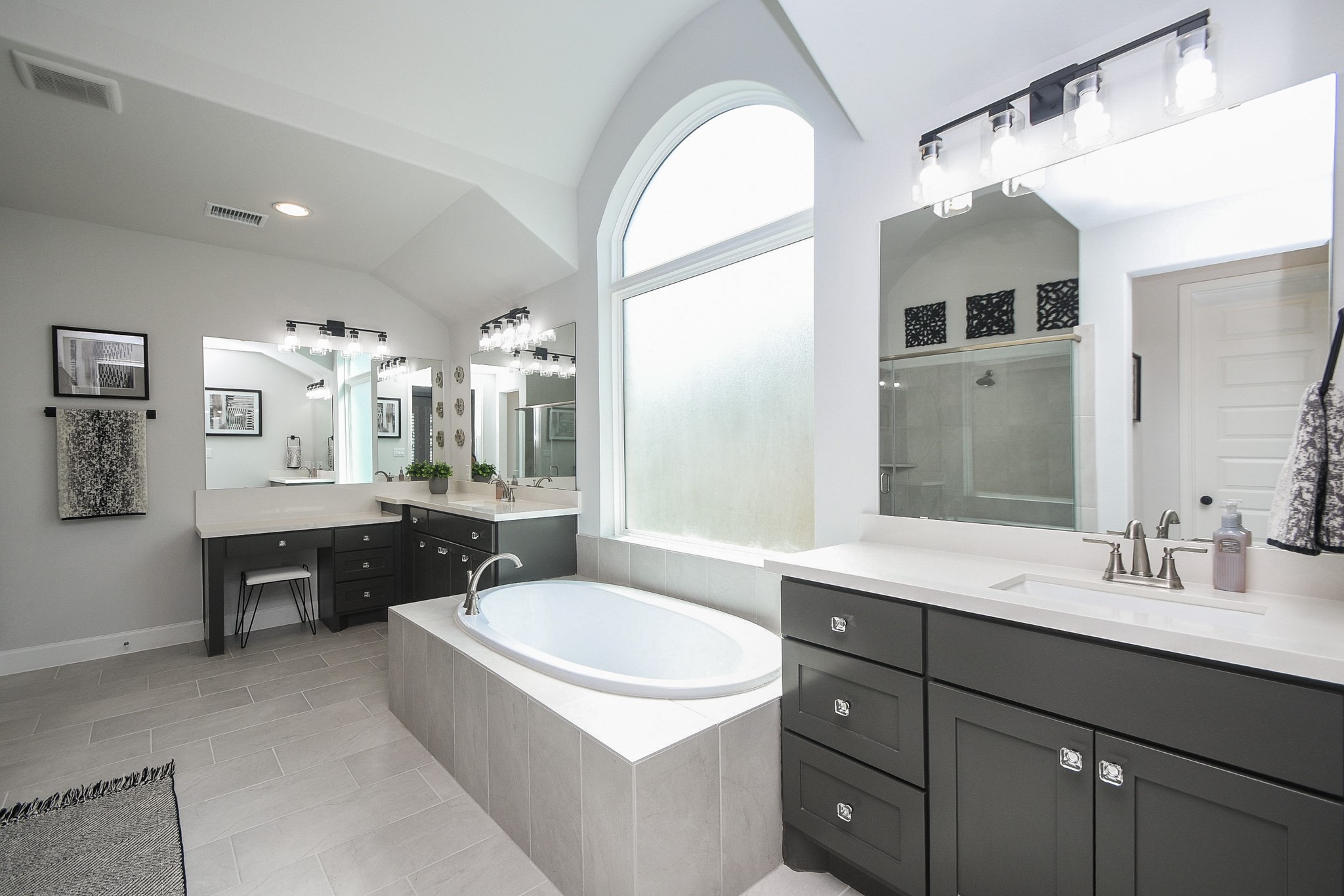 30314 Brook Point Fulshear, TX 77441 - Photo 15 of 38 Ensuite has 24x12 tile, separate vanities, and oversized soaking tub