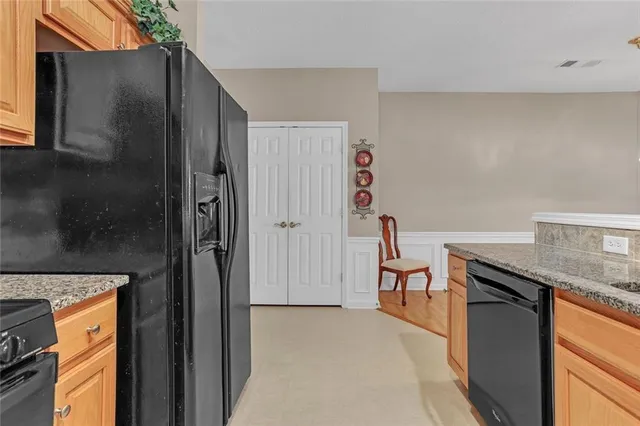 a hallway with washer and dryer