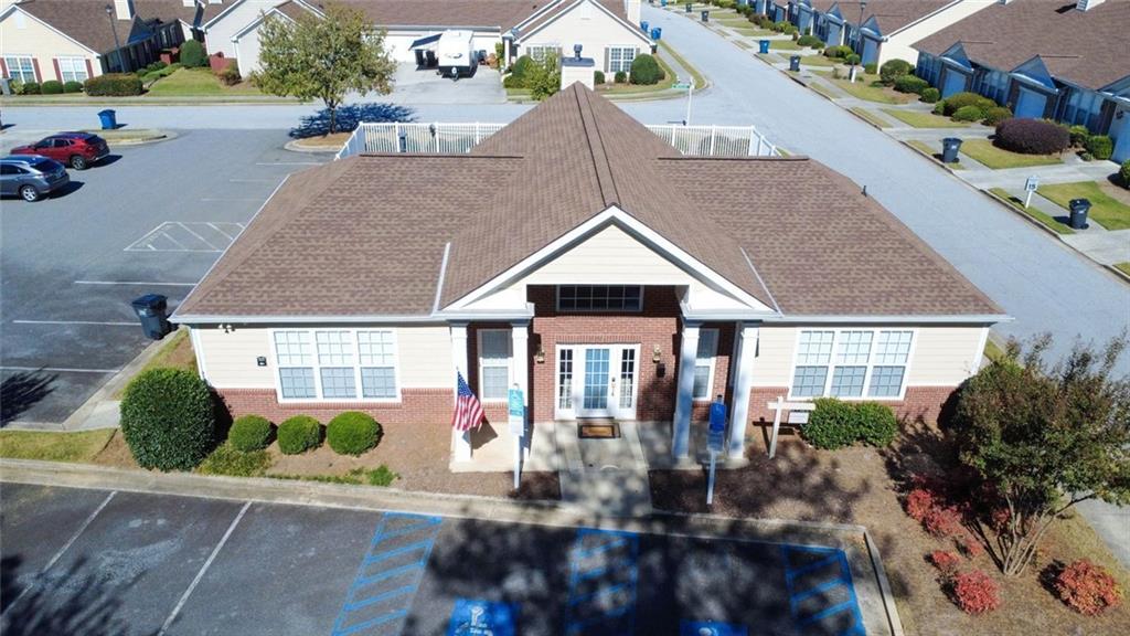 314 Gable Brook Drive Southwest Grayson, GA 30017 - Photo 25 of 26 an aerial view of a house with a yard and potted plants