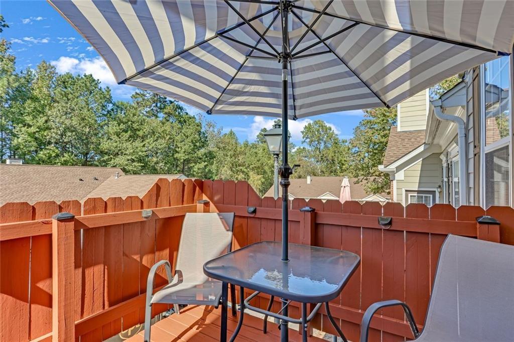 314 Gable Brook Drive Southwest Grayson, GA 30017 - Photo 4 of 26 a backyard of a house with table and chairs
