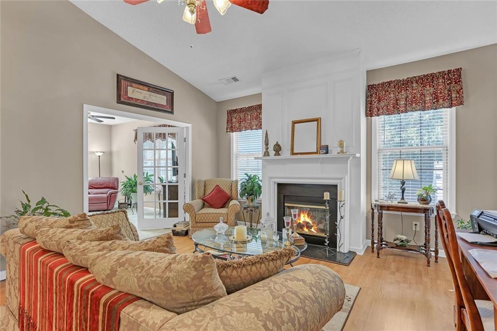 314 Gable Brook Drive Southwest Grayson, GA 30017 - Photo 5 of 26 a living room with furniture and a fireplace
