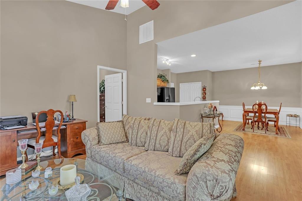 314 Gable Brook Drive Southwest Grayson, GA 30017 - Photo 10 of 26 a living room with furniture and wooden floor