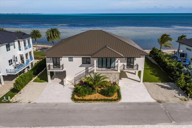a view of kitchen with furniture window and wooden floor