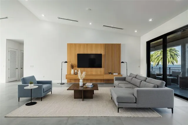 a bathroom with a double vanity sink toilet and shower