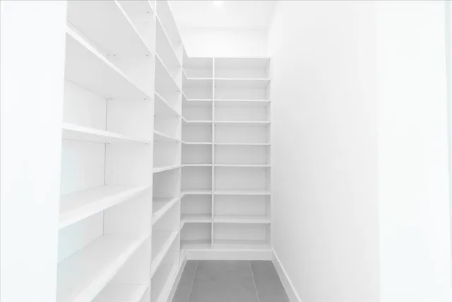 an empty room with a bathroom