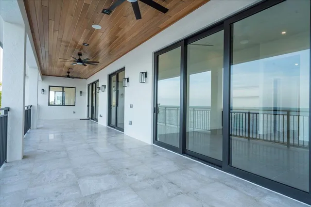 a view of empty room with windows