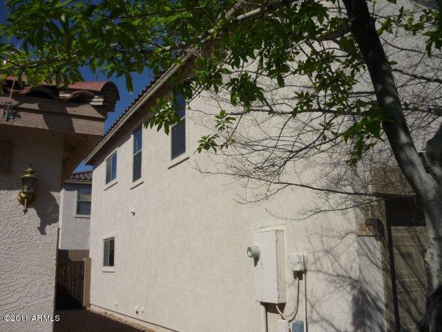 3279 South Bowman Road Apache Junction, AZ 85119 - Photo 4 of 5 METER SIDE OF HOME