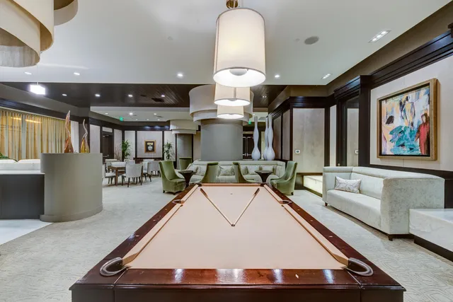a view of a living room and kitchen