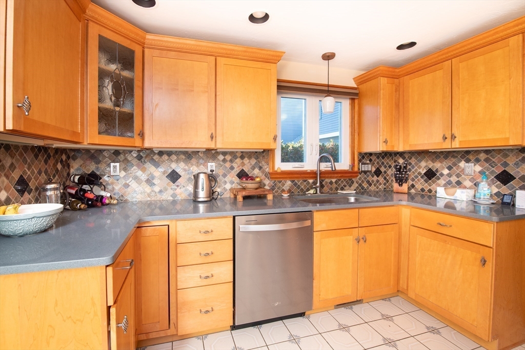 663 Wareham Street, Unit 8 Middleboro, MA 02346 - Photo 11 of 27 a kitchen with a sink a stove and cabinets