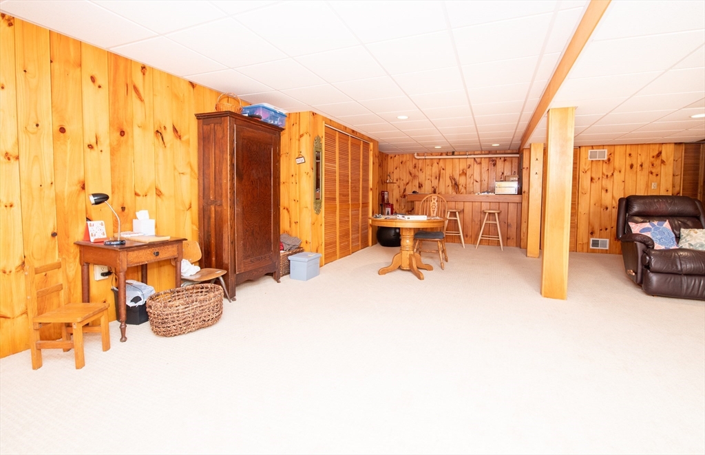 663 Wareham Street, Unit 8 Middleboro, MA 02346 - Photo 21 of 27 a living room with furniture and a large window