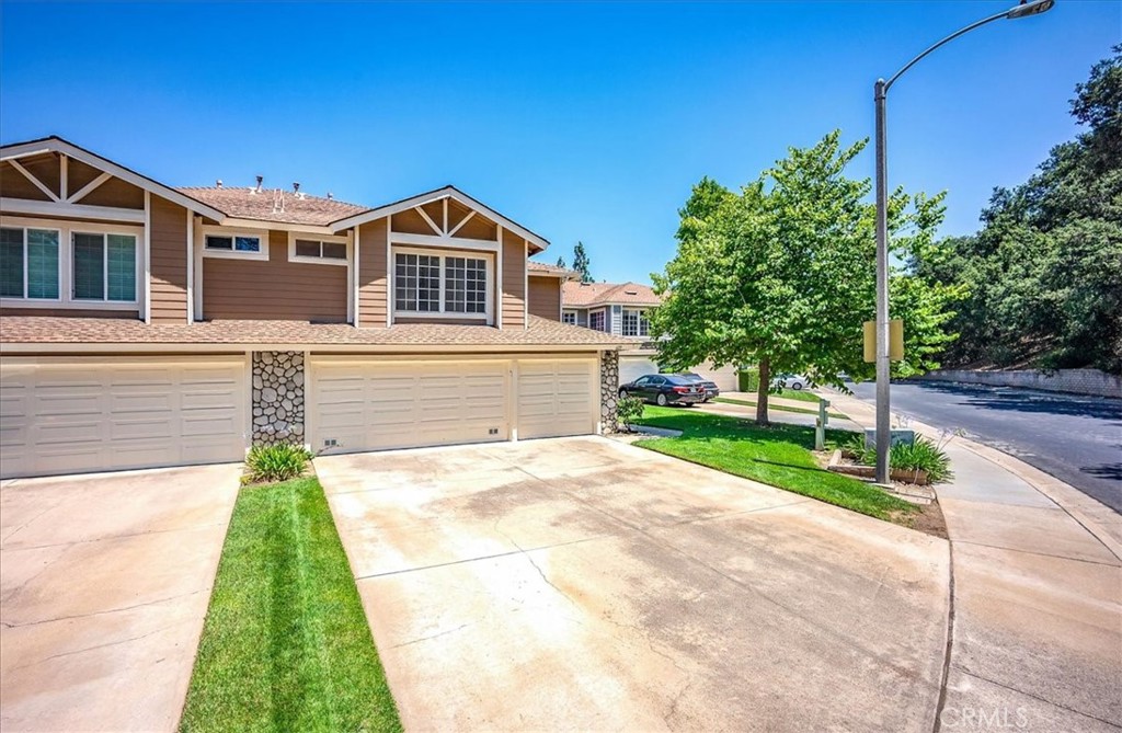 629 Calaveras Road San Dimas, CA 91773 - Photo 3 of 49 a front view of house with yard